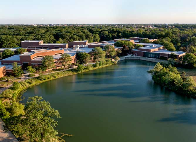 An exterior shot from a drone of the Oakton campus.