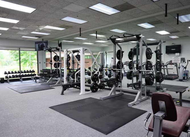 A picture of the weights and exercise machines at Oakton College's Fitness Center.