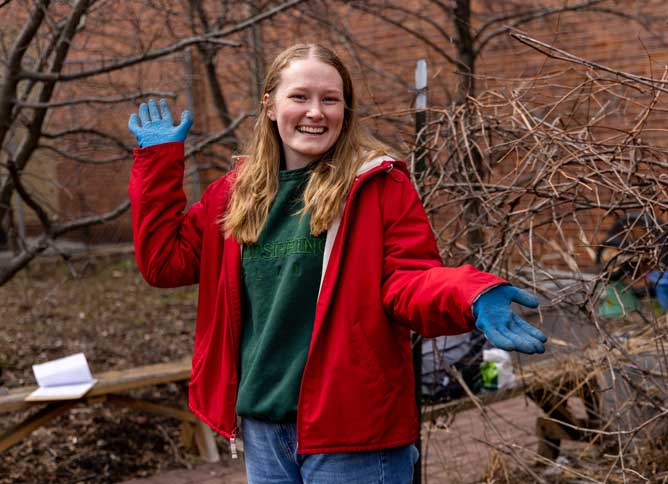 Oakton College students volunteering at a local community garden during Week of Service.