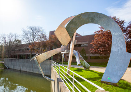 Silver sculpture outside of Des Plaines campus