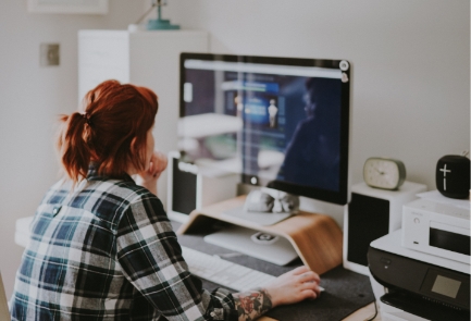 Girl in front of computer