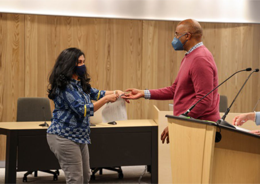 Kanchana Mendes, Ph.D., Professor of Biology (left), accepts her ACUE certificate of completion from Ileo Lott, Ed.D., Provost and Vice President for Academic Affairs, at a pinning ceremony on May 17.